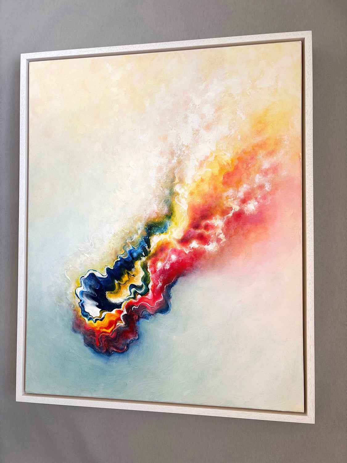 Vibrant flowing abstract painting on canvas with white float frame 