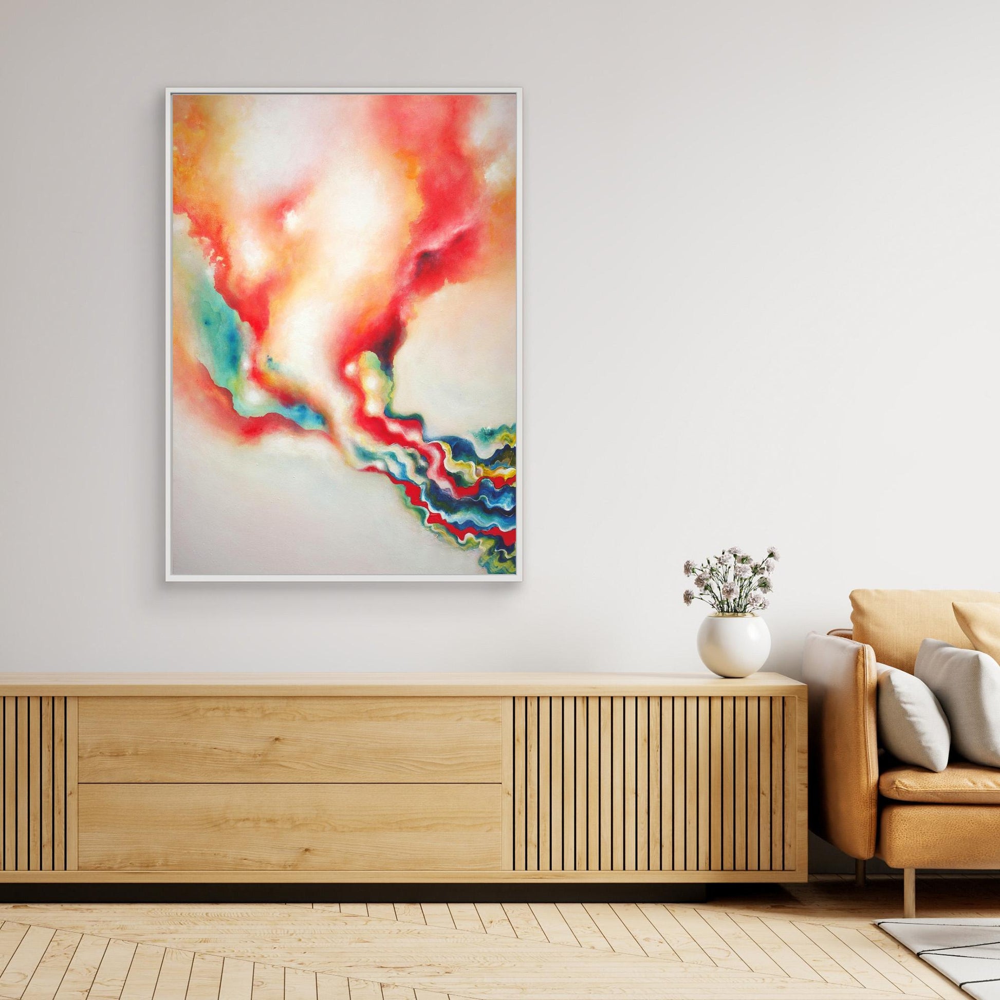 Large warm abstract art print on canvas in stylish interior 