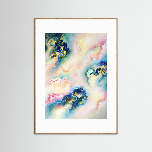 Flowing abstract art print with warm spring colours framed in an oak frame 