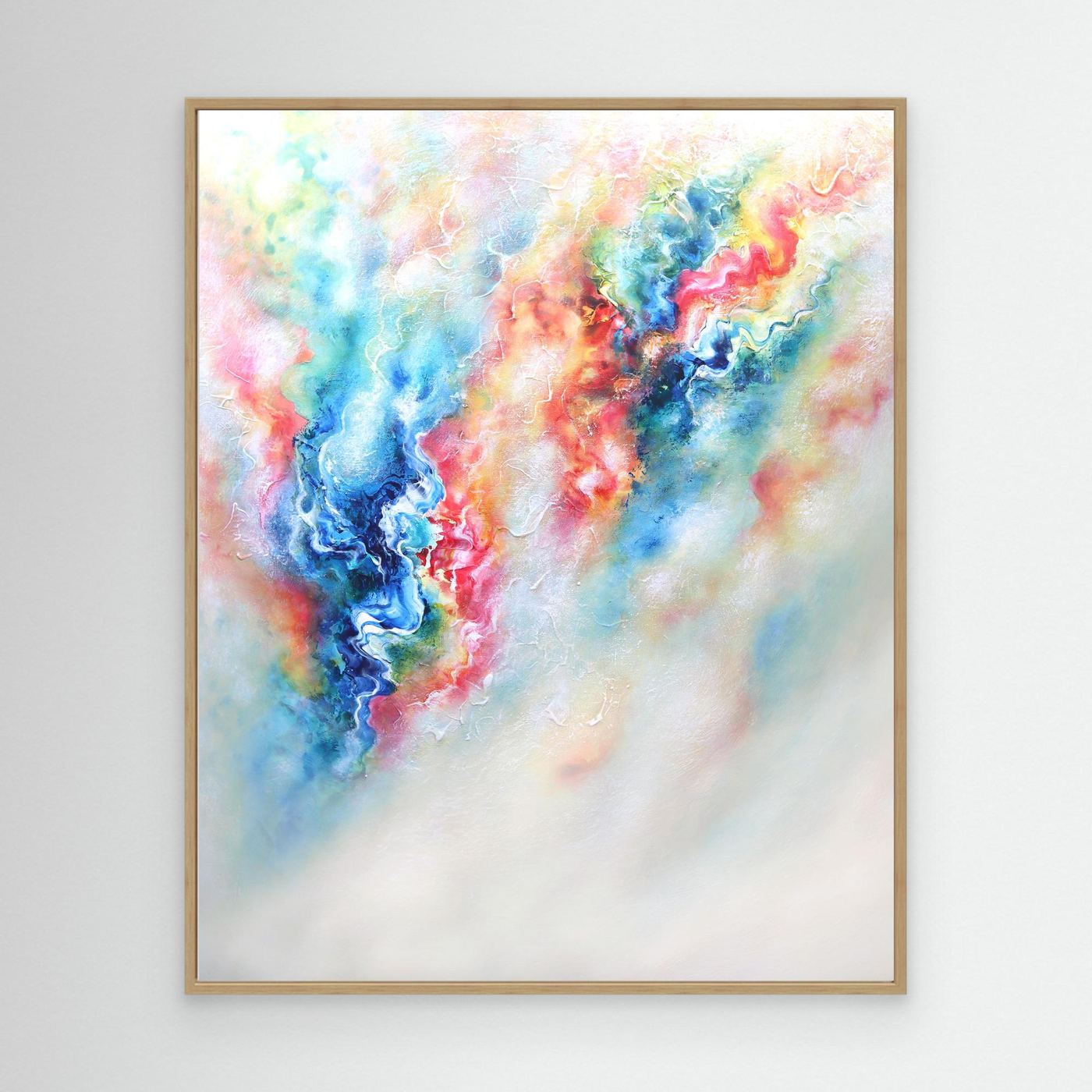 Colourful and vibrant abstract canvas print in an oak frame 