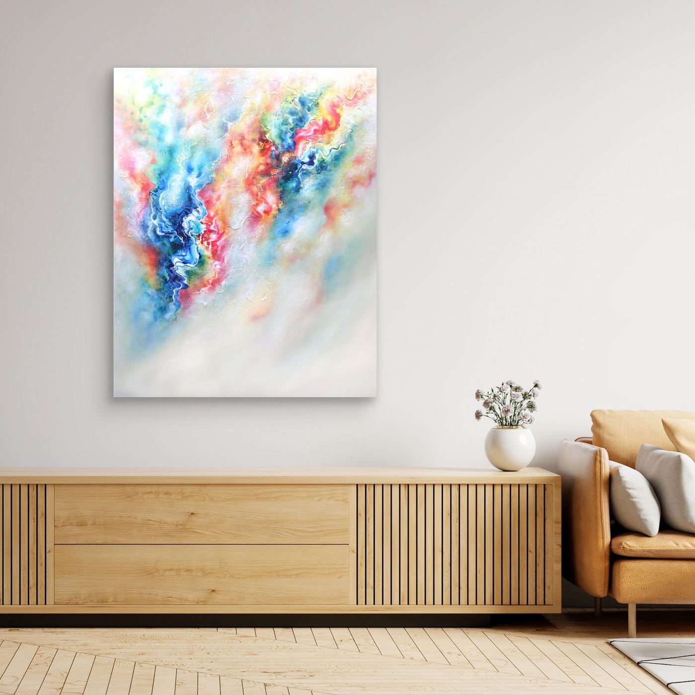Colourful and uplifting abstract print on canvas in a modern living space  