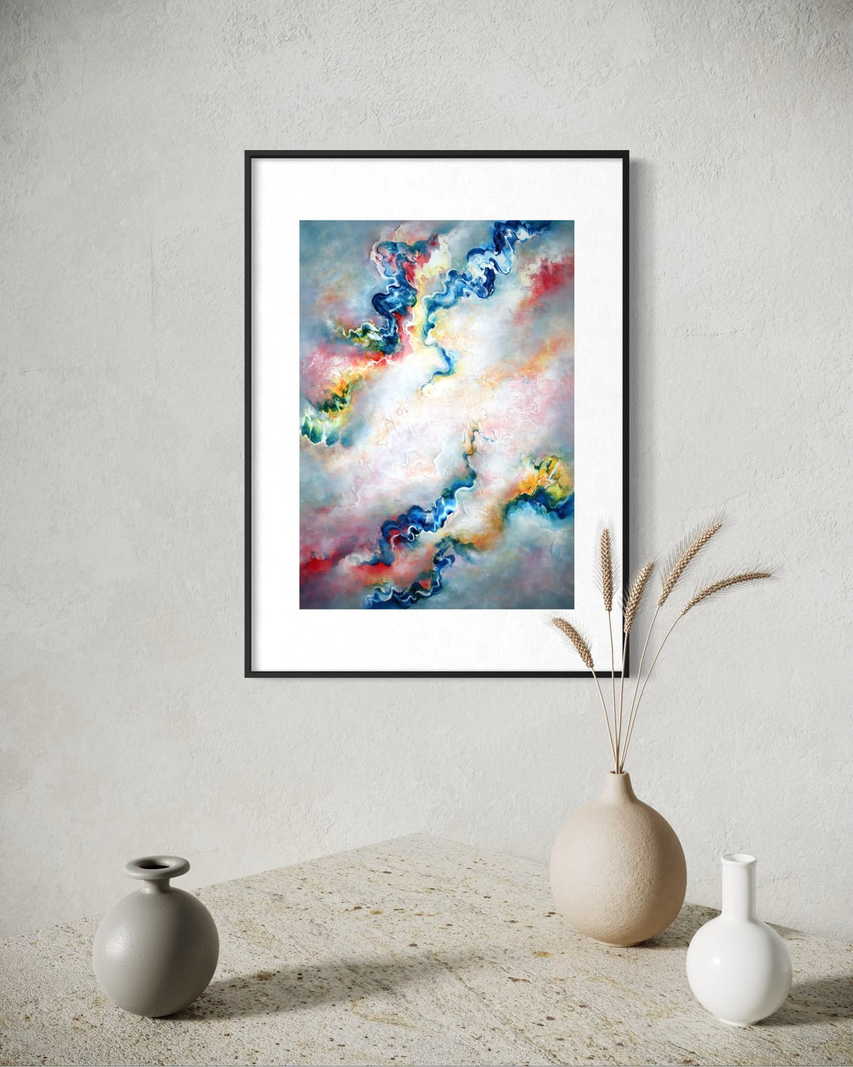 Framed grey abstract art on a wall with decorative vases below