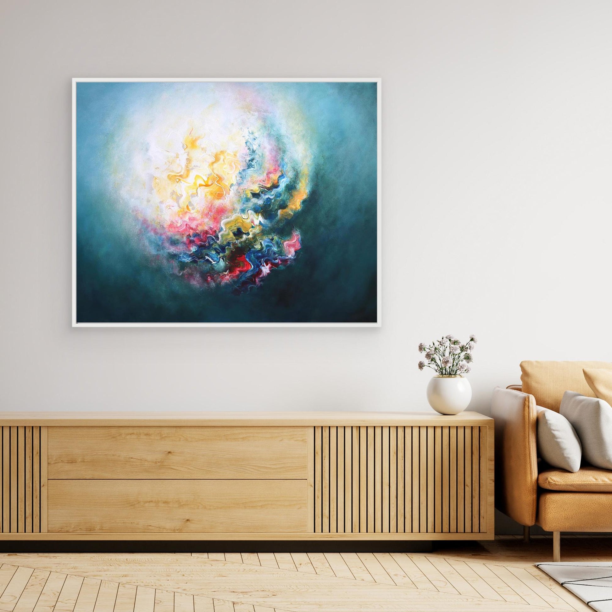 Large vibrant abstract canvas print in a contemporary living room 