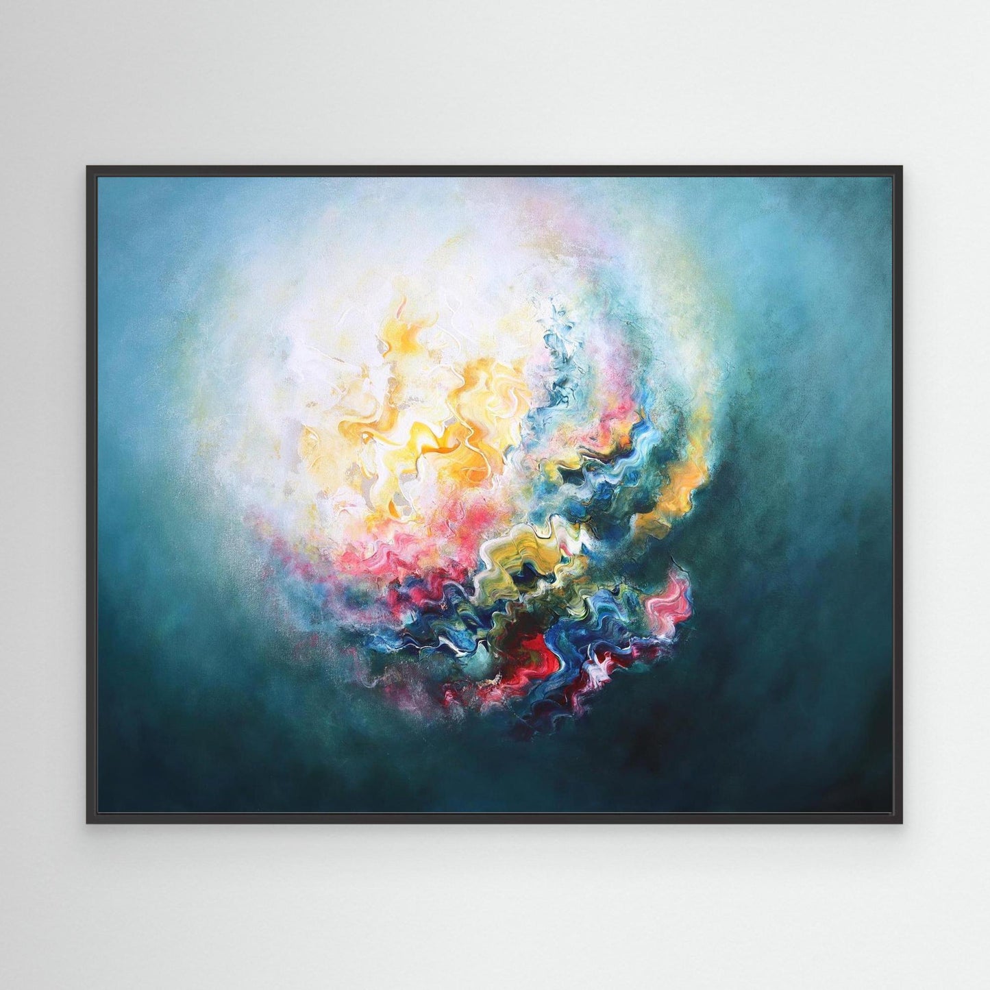 Large blue green abstract canvas print framed in a black float frame 